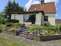 Hausansicht Rückseite mit Terrasse